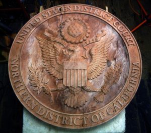 This is a redwood burl crest located at the US District Court in San Francisco, CA.