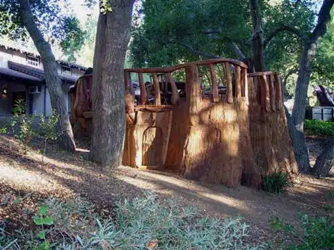 Side of Nook Redwood Carving in Front Yard Tree Stump