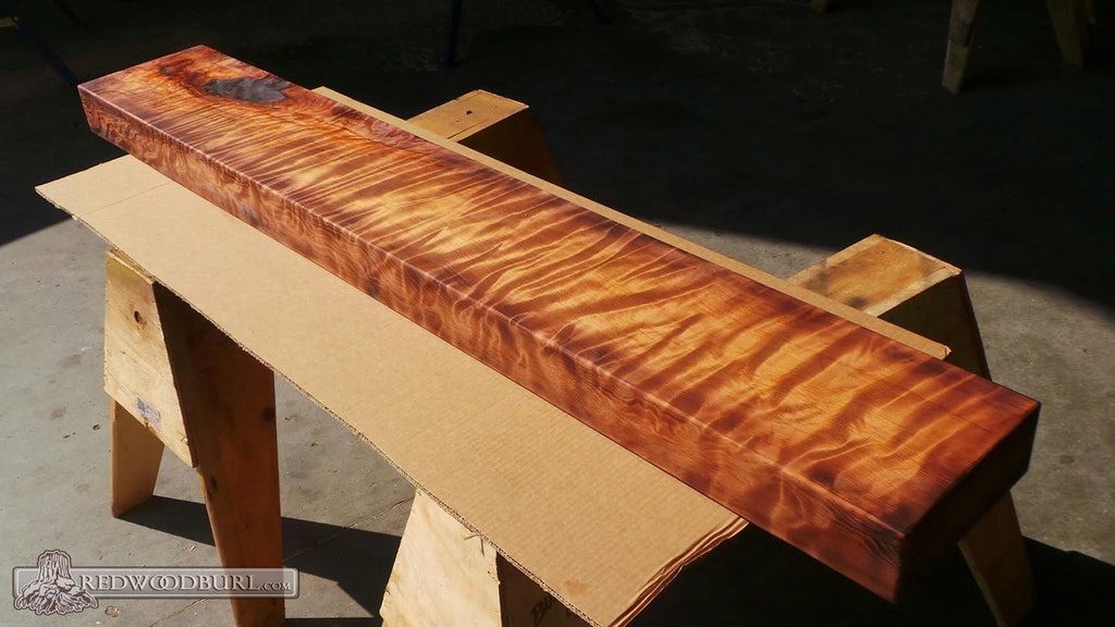 An example of one of our redwood mantels that has been shaped and finished!