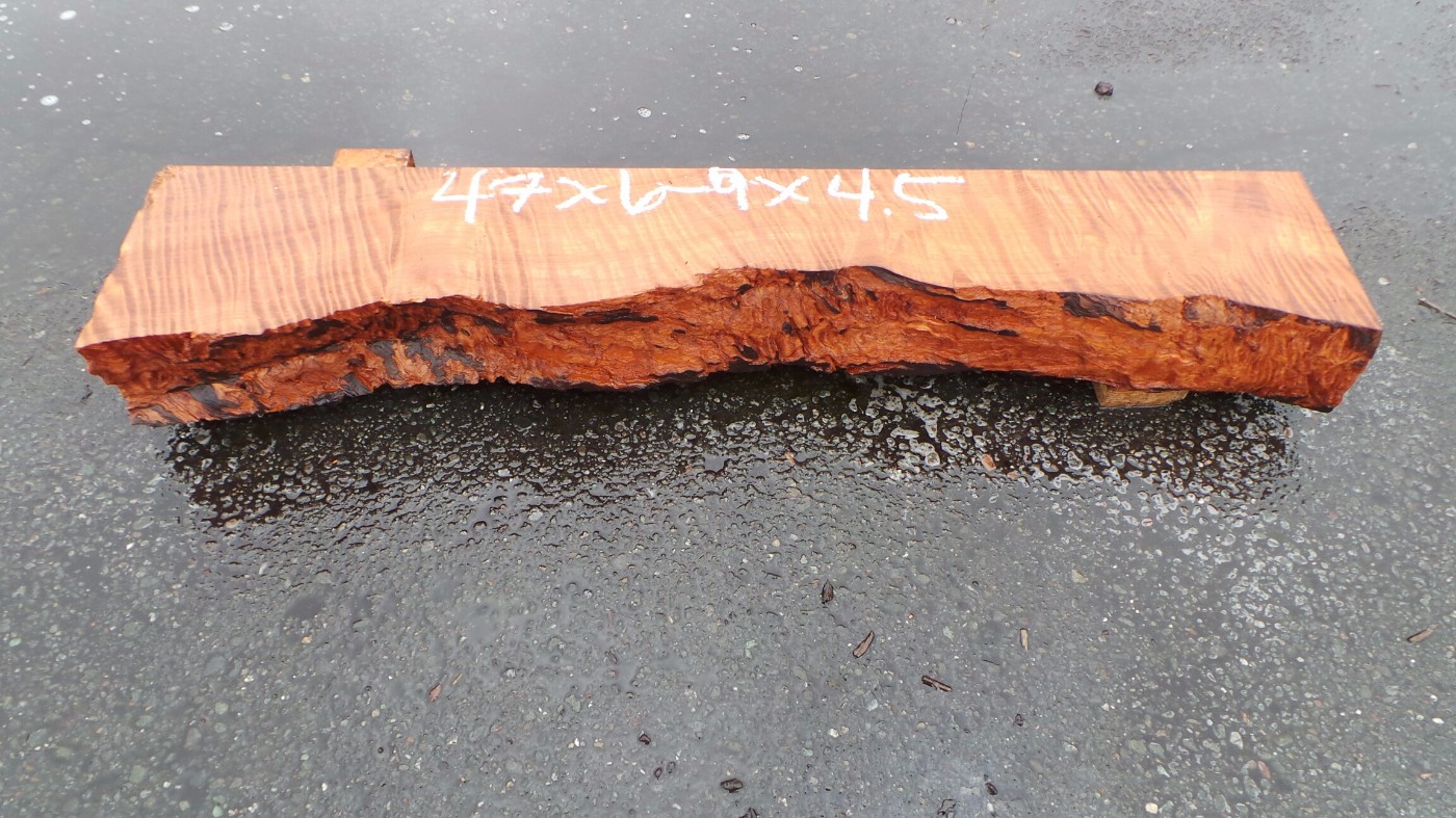 Rustic wood mantelpiece - live edge texture redwood