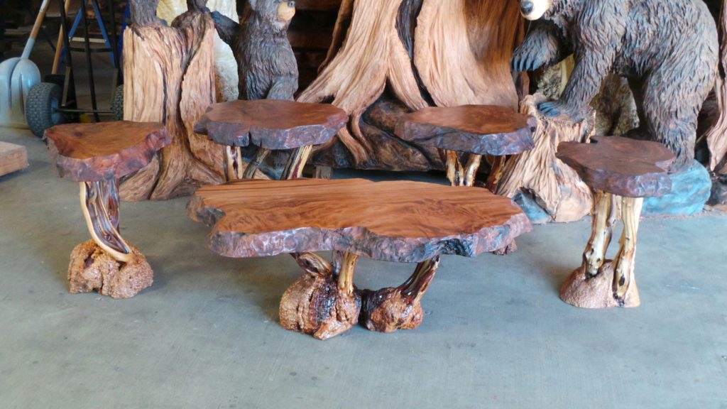 Redwood furniture - a redwood burl coffee table and four end tables finished in tung oil