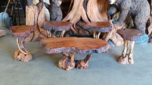 Redwood furniture - a redwood burl coffee table and four end tables finished in tung oil