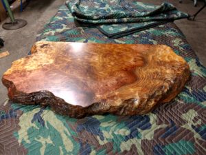 Redwood furniture - a burl wood vanity slab finished in conversion varnish