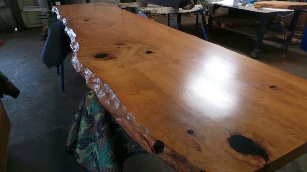Burl dining table finished in conversion varnish