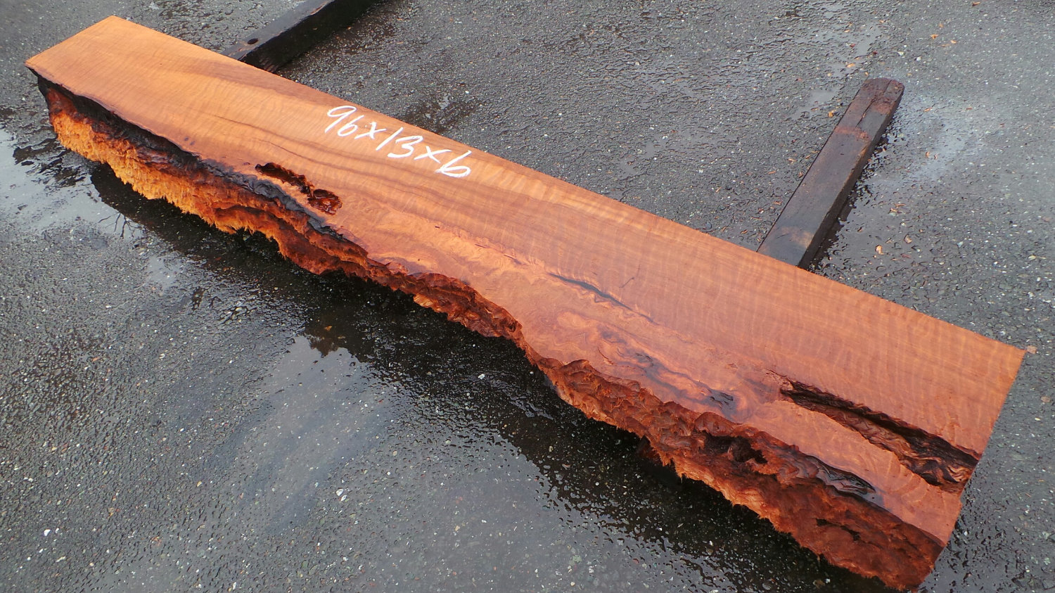 Redwood mantel with voids