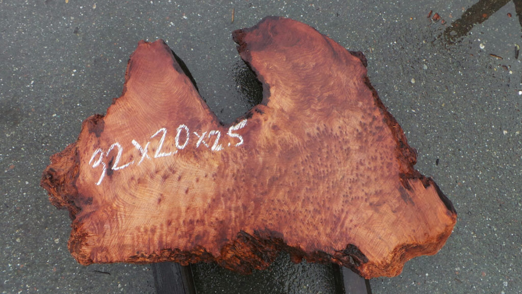 dark curled redwood slab