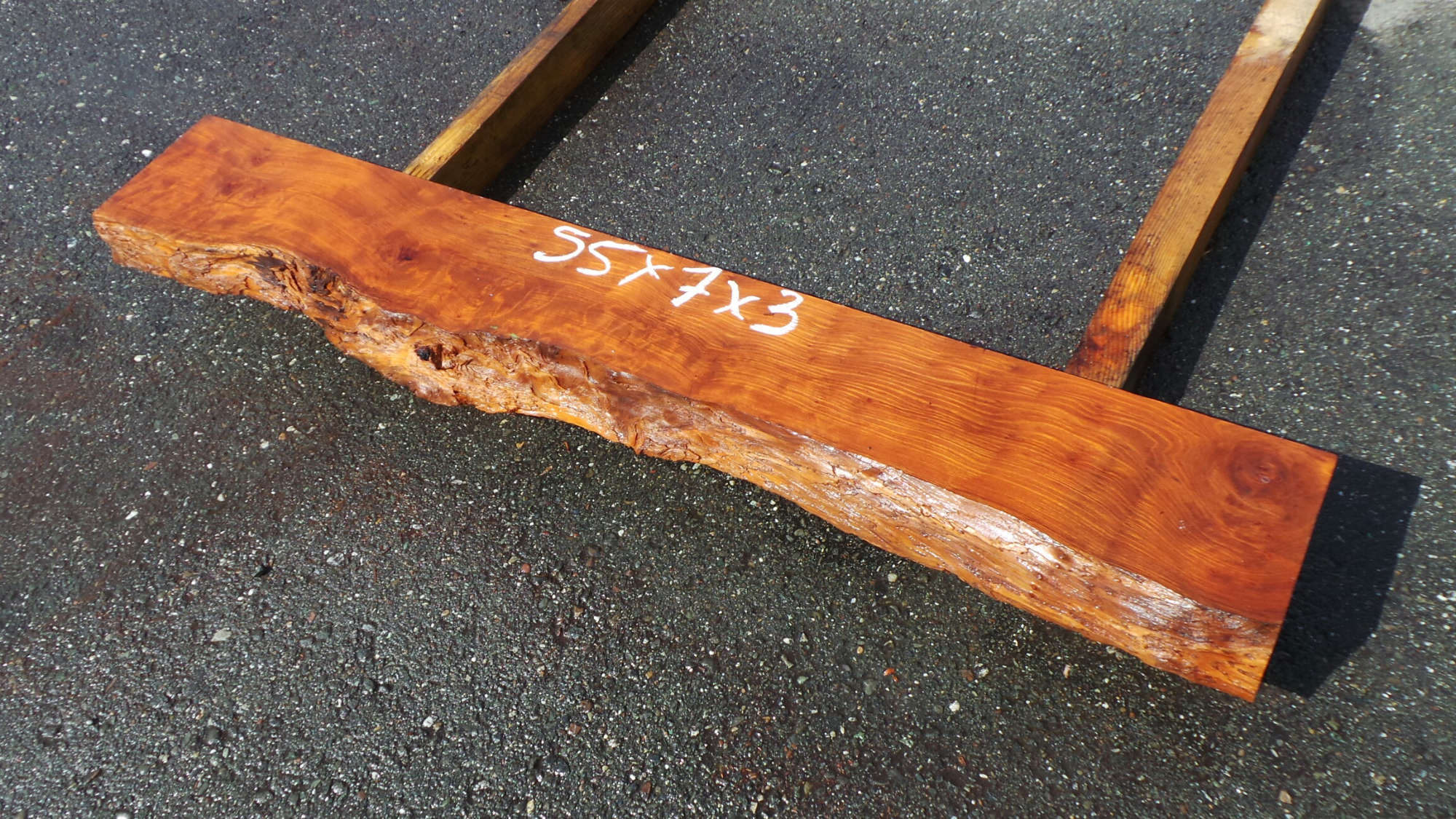 rustic redwood mantelpiece
