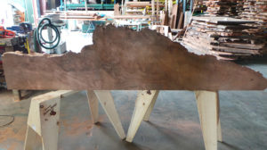Phenomenal example of a rustic, live edge redwood fireplace mantel. Use as a hanging wall shelf or above your fireplace.