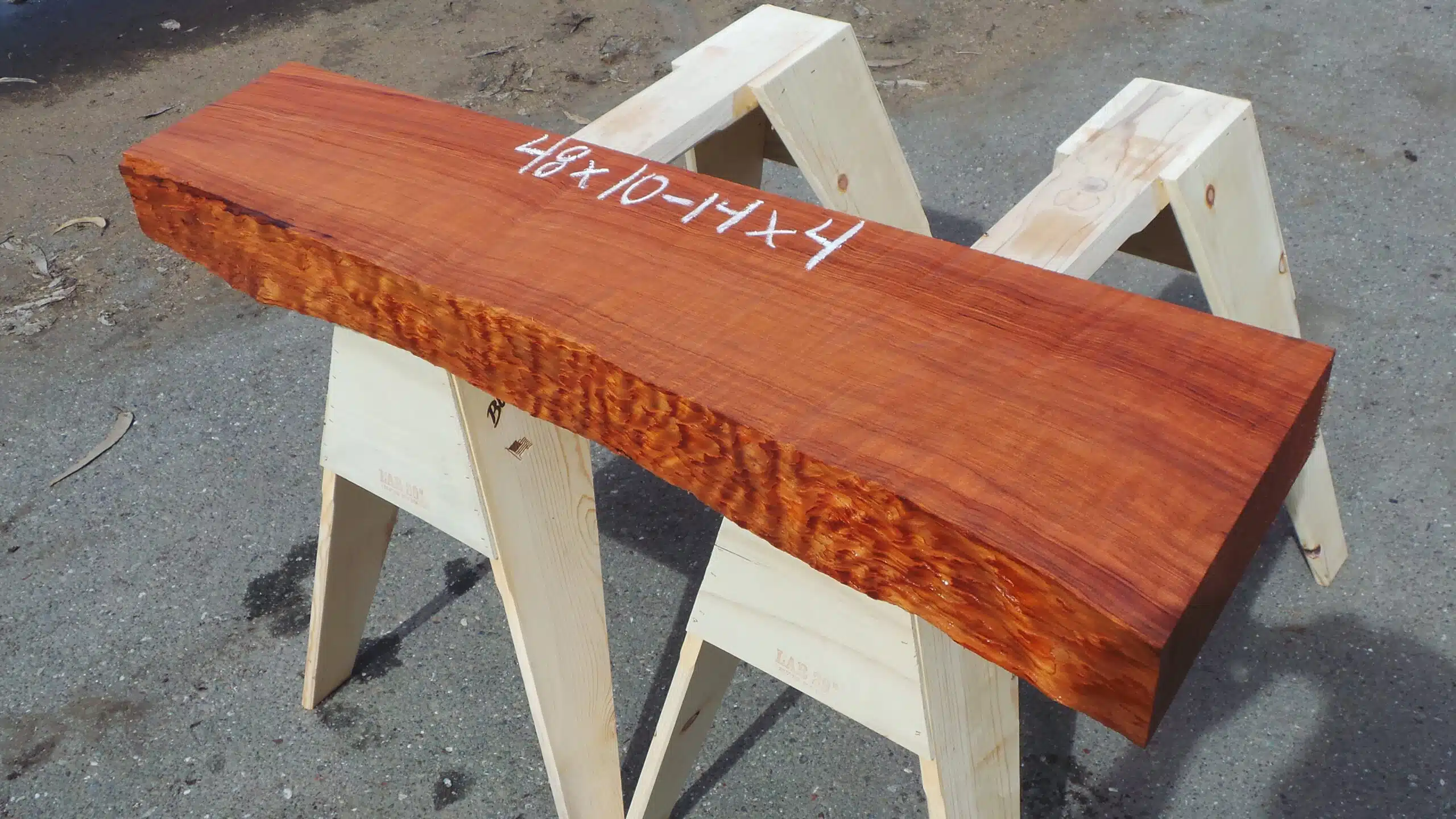 Live-edge redwood mantel or shelf piece.